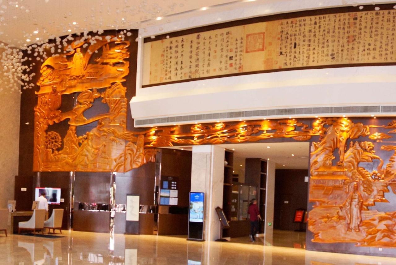 Hotel Howard Johnson Xiangyu Plaza Linyi à Linyi  Extérieur photo