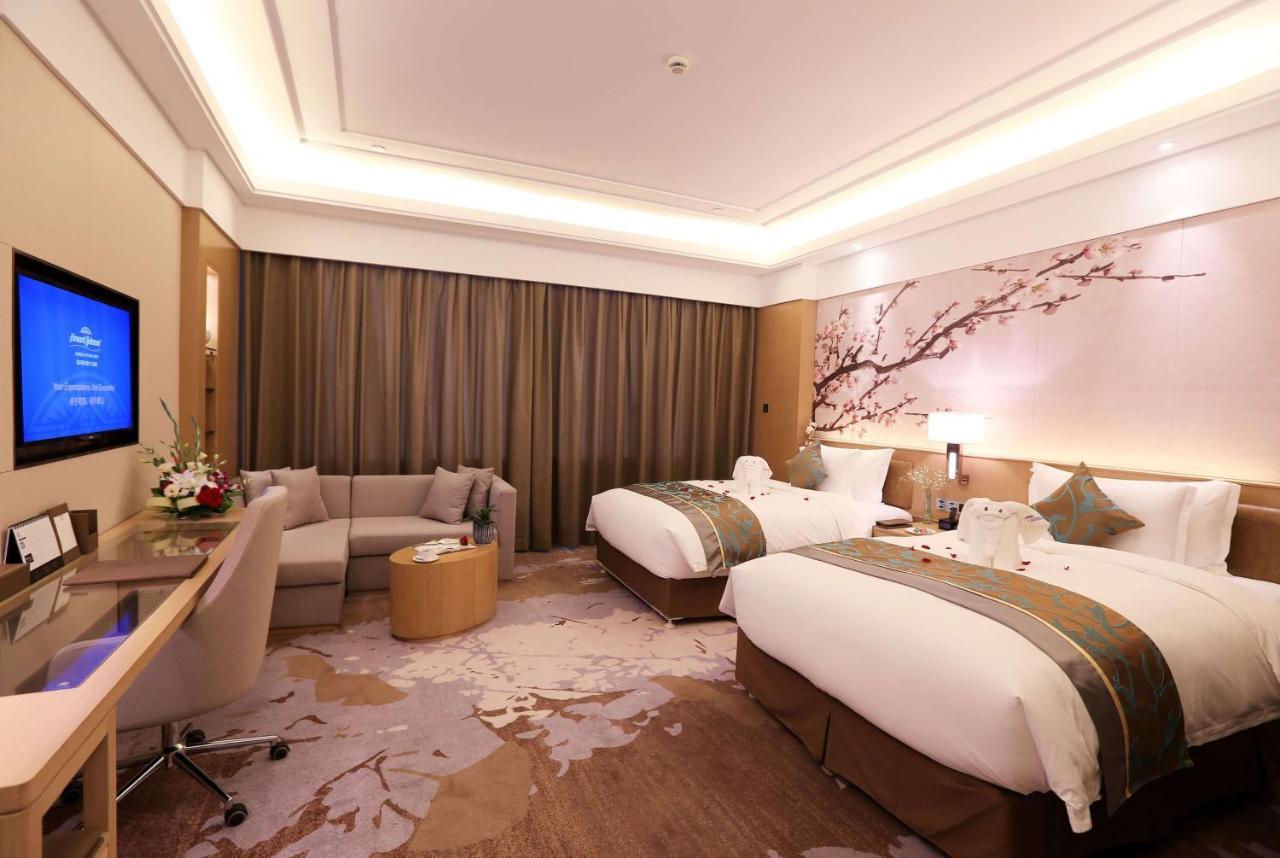 Hotel Howard Johnson Xiangyu Plaza Linyi à Linyi  Extérieur photo