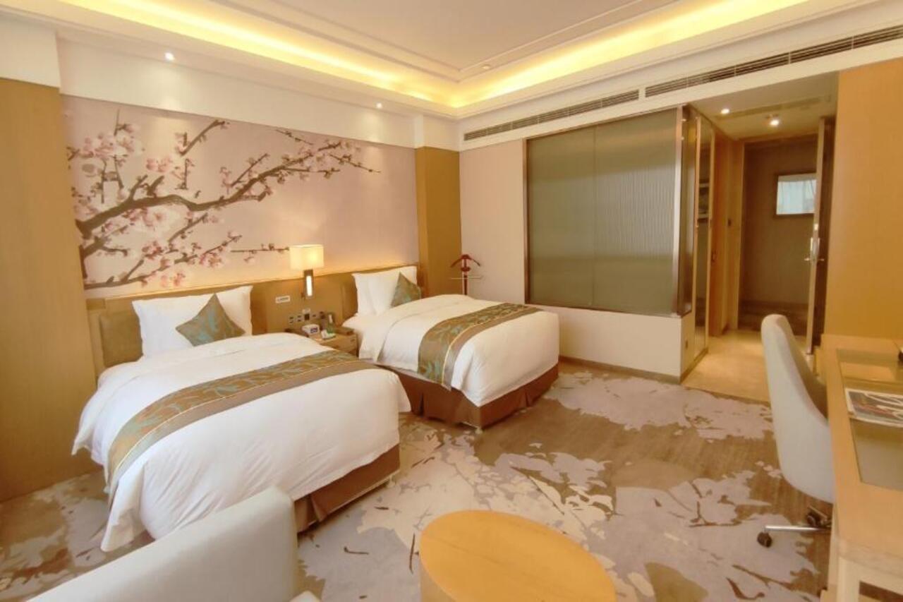 Hotel Howard Johnson Xiangyu Plaza Linyi à Linyi  Extérieur photo