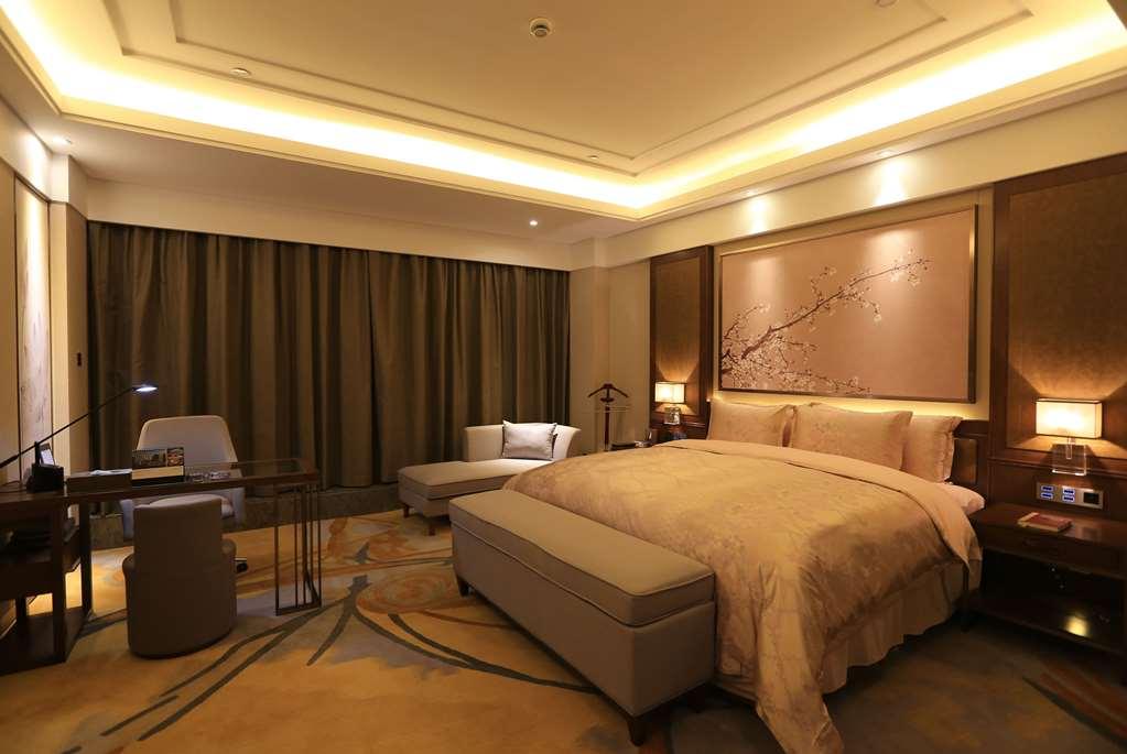 Hotel Howard Johnson Xiangyu Plaza Linyi à Linyi  Chambre photo