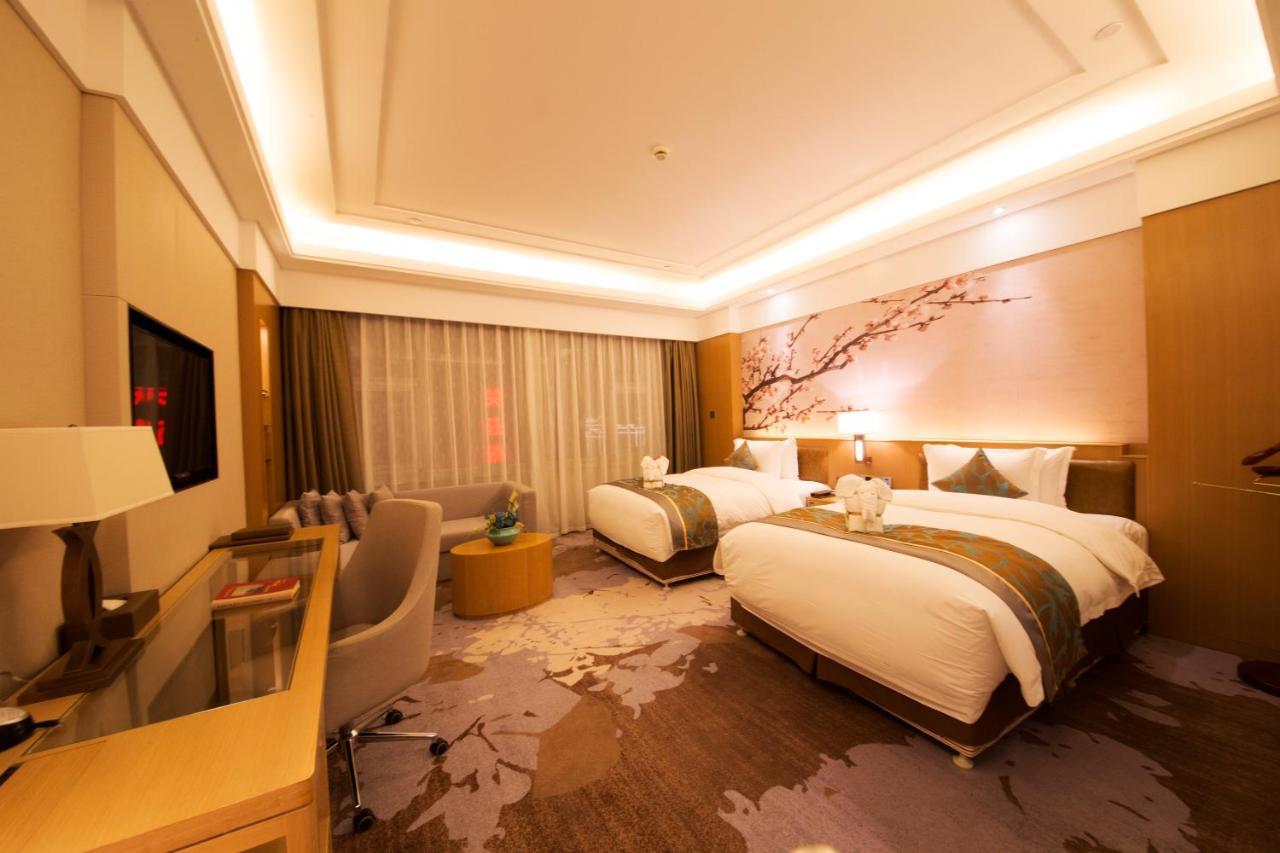 Hotel Howard Johnson Xiangyu Plaza Linyi à Linyi  Extérieur photo