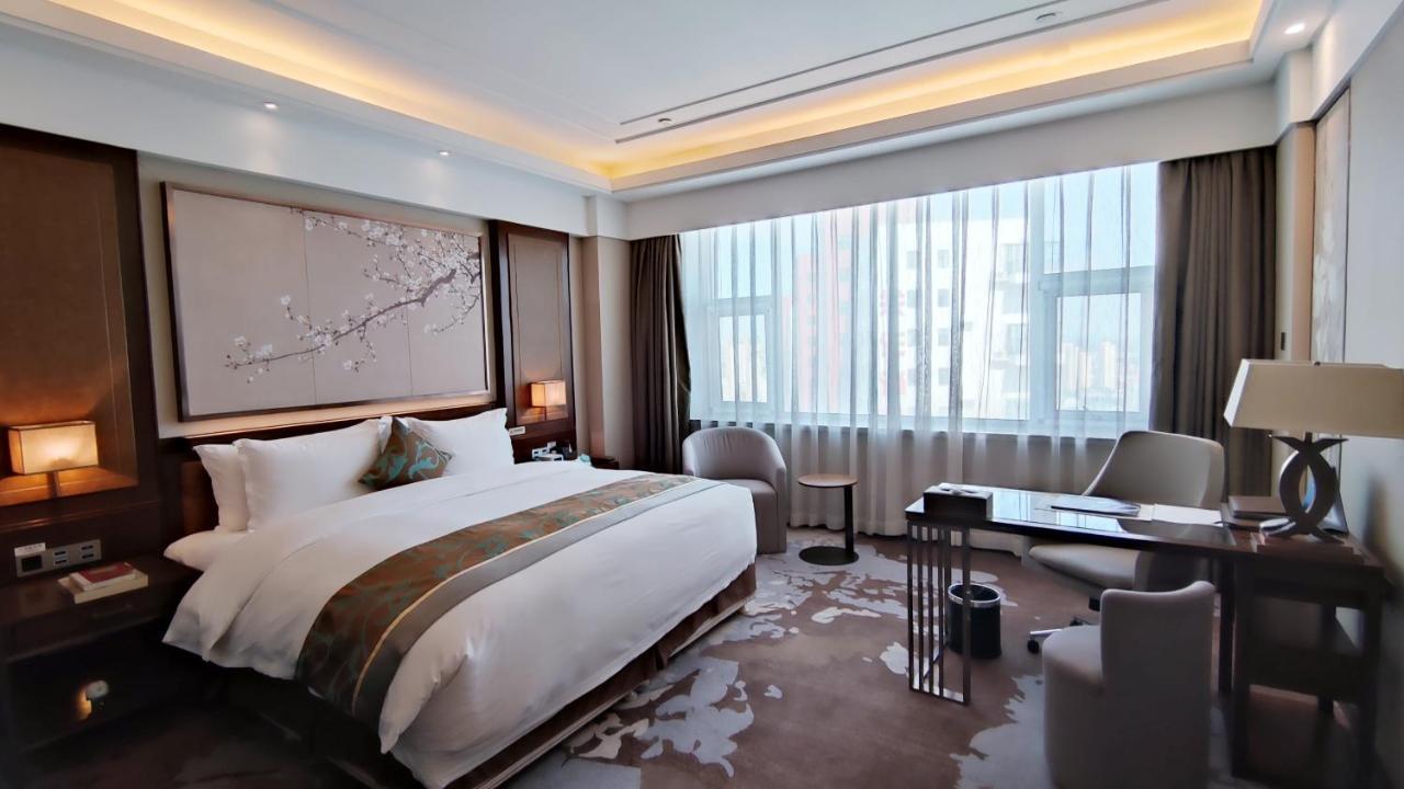 Hotel Howard Johnson Xiangyu Plaza Linyi à Linyi  Extérieur photo