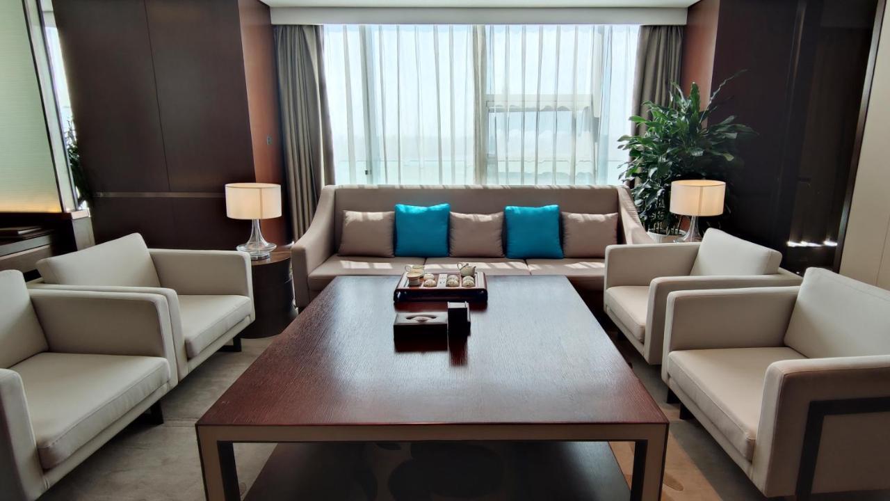 Hotel Howard Johnson Xiangyu Plaza Linyi à Linyi  Extérieur photo